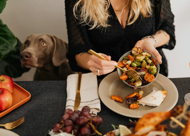 A Person Holding a Bowl of Dish